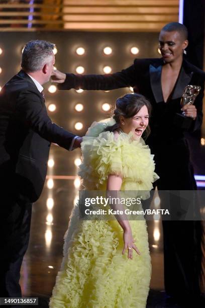 Layton Williams and Comedy Entertainment Programme Award winner for 'Friday Night Live' Rosie Jones on stage during the 2023 BAFTA Television Awards...