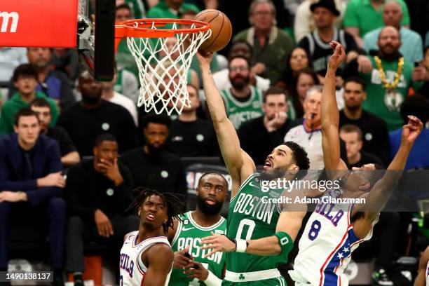 Jayson Tatum of the Boston Celtics shoots the ball against De'Anthony Melton of the Philadelphia 76ers during the second quarter in game seven of the...