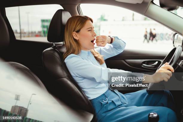 falling a sleep - yawning woman stockfoto's en -beelden