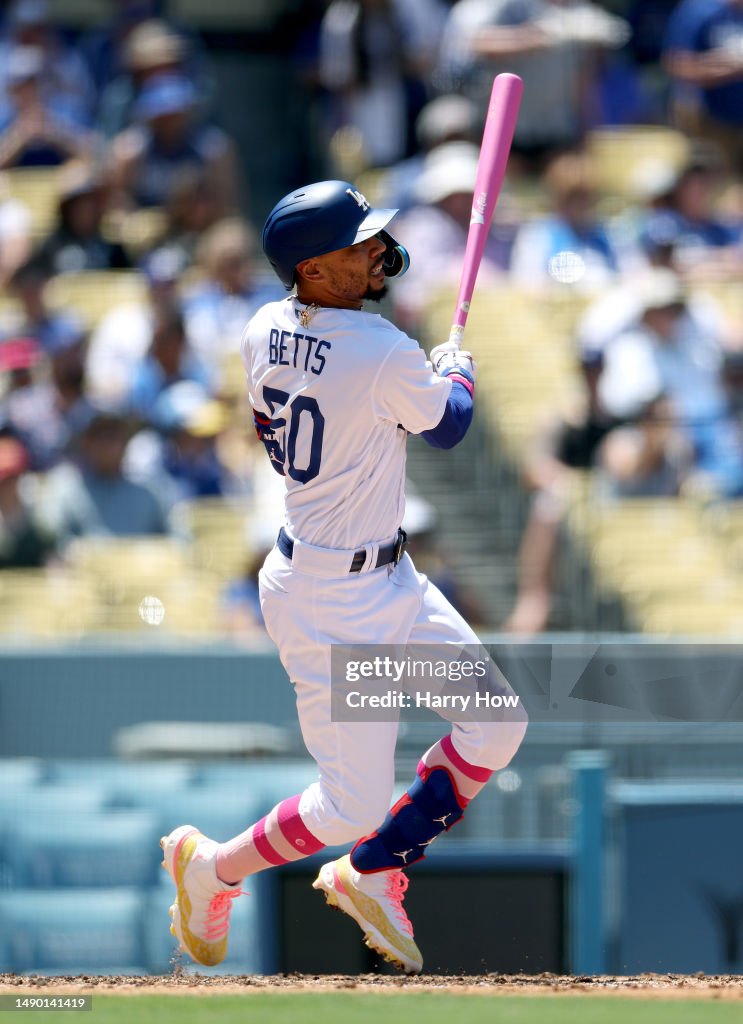 Mookie Betts of the Los Angeles Dodgers watches his two run homerun ...