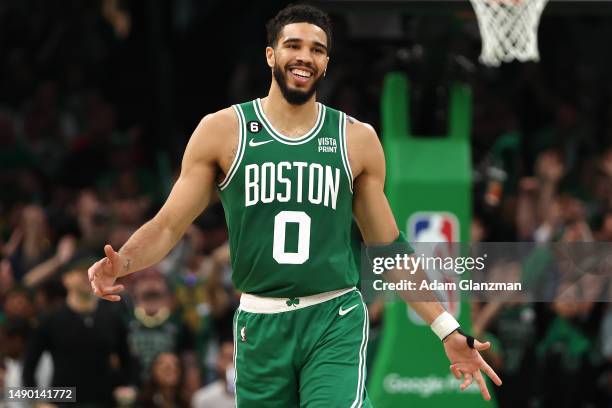 Jayson Tatum of the Boston Celtics celebrates a basket against the Philadelphia 76ers during the third quarter in game seven of the 2023 NBA Playoffs...