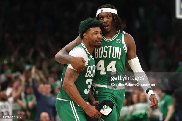 Marcus Smart and Robert Williams III of the Boston Celtics talk against the Philadelphia 76ers during the third quarter in game seven of the 2023 NBA...