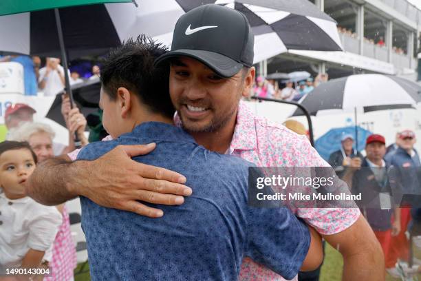 Jason Day of Australia and son Dash Day celebrate after Day finished his round during the final round of the AT&T Byron Nelson at TPC Craig Ranch on...