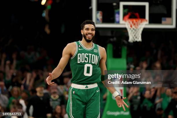 Jayson Tatum of the Boston Celtics celebrates a basket against the Philadelphia 76ers during the third quarter in game seven of the 2023 NBA Playoffs...
