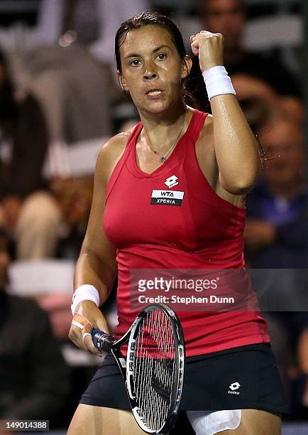 Marion Bartoli of France celebrates after winning match point against Yung-Jan Chan of Taipei in their semifinal match during day eight of the...