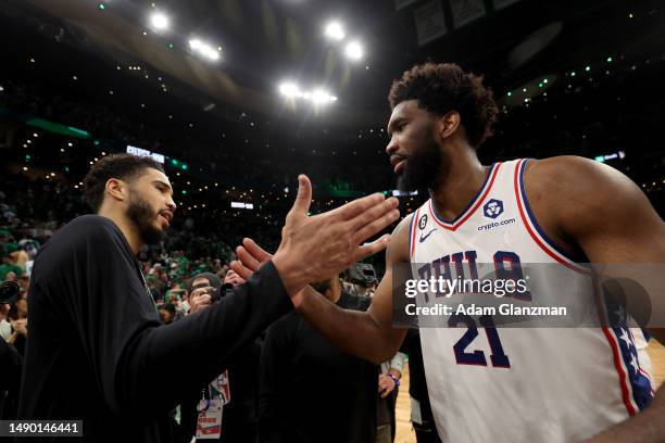 Jayson Tatum of the Boston Celtics and Joel Embiid of the Philadelphia 76ers shake hands after game seven of the 2023 NBA Playoffs Eastern Conference...