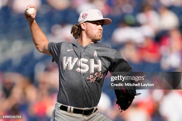 Jake Irvin of the Washington Nationals pitches in the fourth inning during game two of a doubleheader against the New York Mets on May 14, 2023 in...