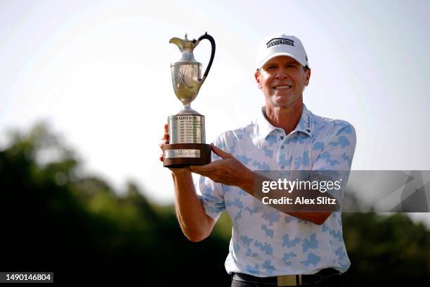 Steve Stricker of the United States poses with the trophy after winning the Regions Tradition at Greystone Golf and Country Club on May 14, 2023 in...