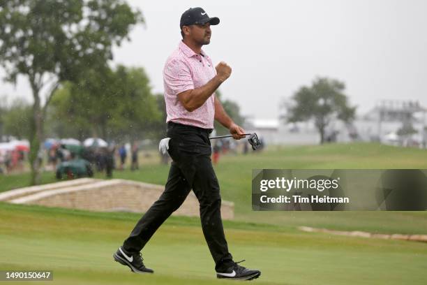 Jason Day of Australia reacts after making birdie on the 18th green during the final round of the AT&T Byron Nelson at TPC Craig Ranch on May 14,...