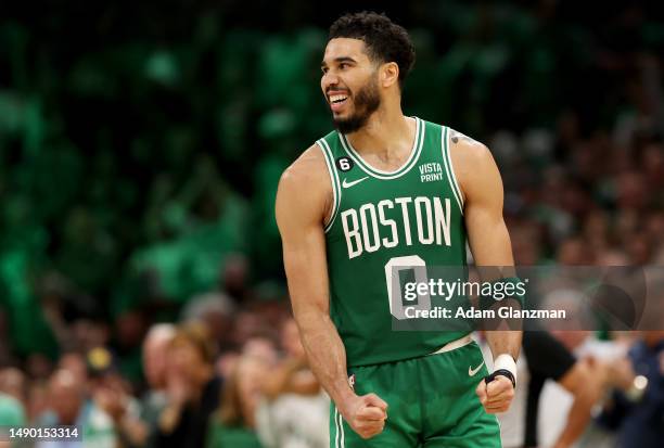 Jayson Tatum of the Boston Celtics celebrates a basket against the Philadelphia 76ers during the fourth quarter in game seven of the 2023 NBA...