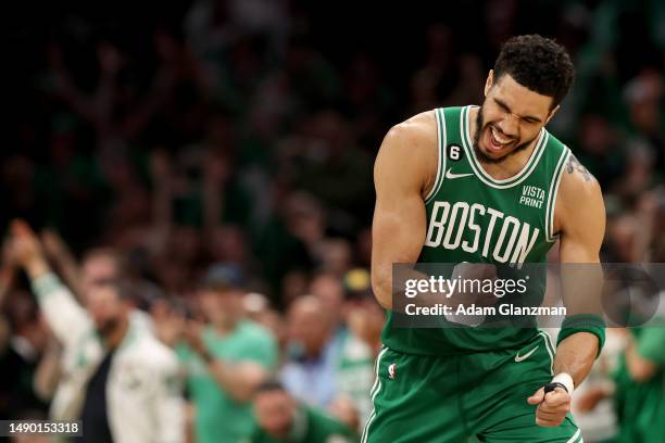 Jayson Tatum of the Boston Celtics celebrates a basket against the Philadelphia 76ers during the fourth quarter in game seven of the 2023 NBA...