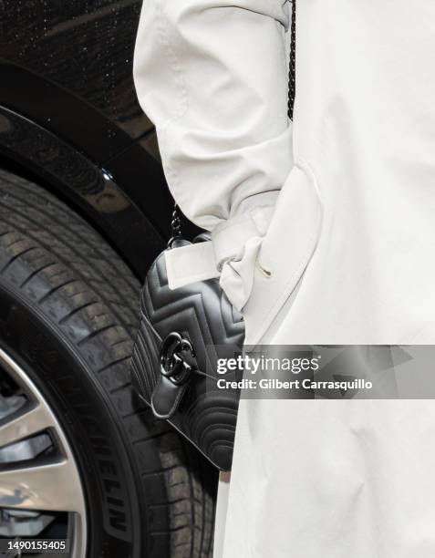 Quinta Brunson, handbag detail, is seen leaving after delivering the keynote address at the 2023 Graduate School of Education at the University of...