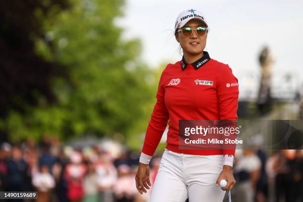 Minjee Lee of Australia reacts to a putt on the 18th green during the final round of the Cognizant Founders Cup at Upper Montclair Country Club on...