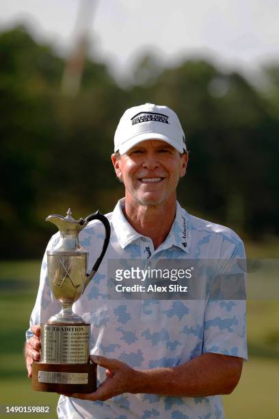 Steve Stricker of the United States poses with the trophy after wining the Regions Tradition at Greystone Golf and Country Club on May 14, 2023 in...