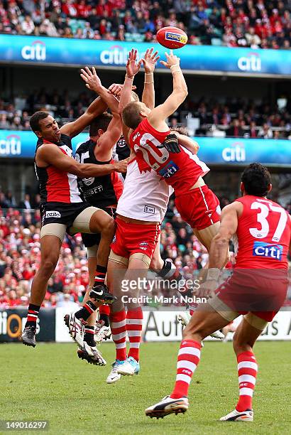 Swans and Saints players contest possession during the round 17 AFL match between the Sydney Swans and the St Kilda Saints at the Sydney Cricket...