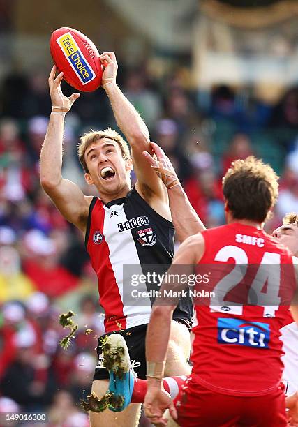 Sam Dunell of the Saints takes a mark during the round 17 AFL match between the Sydney Swans and the St Kilda Saints at the Sydney Cricket Ground on...