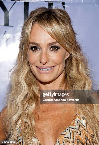 Television personality Taylor Armstrong arrives at the grand opening of Kyle Richards' new boutique "Kyle By Alene Too" on July 21, 2012 in Beverly...