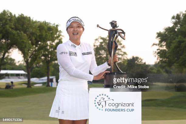 Jin Young Ko of South Korea poses for a photo with the trophy after a playoff win during the final round of the Cognizant Founders Cup at Upper...