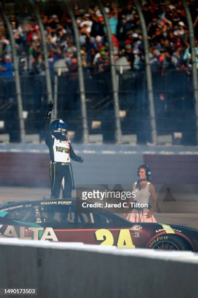 William Byron, driver of the Axalta Throwback Chevrolet, celebrates after winning the NASCAR Cup Series Goodyear 400 at Darlington Raceway on May 14,...