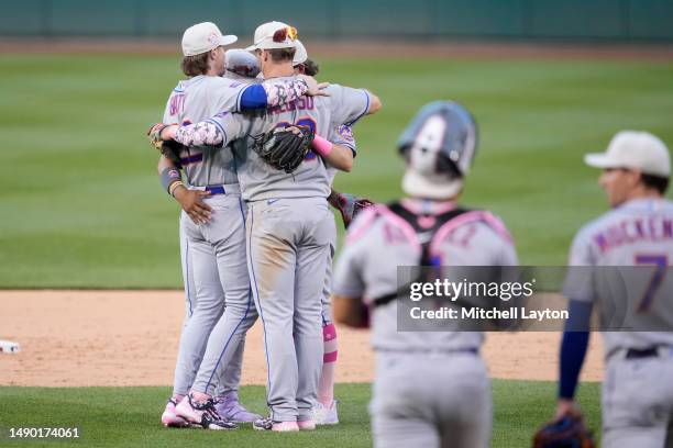 The New York Mets celebrate a win after a baseball game against the New York Mets on May 14, 2023 at Nationals Park in Washington, DC.