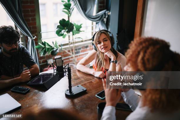 group of people in a live podcast show - radio host stock pictures, royalty-free photos & images