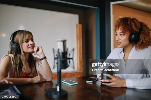 live podcast in a downtown los angeles studio - los angeles press stock pictures, royalty-free photos & images