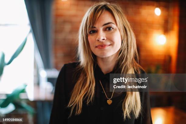 portrait of a businesswoman - mid adult women stock pictures, royalty-free photos & images