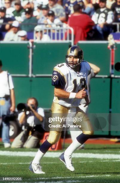 Quarterback Kurt Warner of the St. Louis Rams runs a route at the wide receiver position in the game between the St. Louis Rams vs the New York Jets...