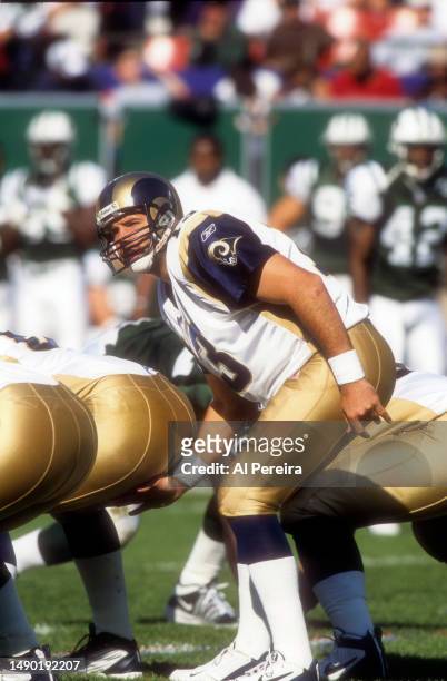 Quarterback Kurt Warner of the St. Louis Rams drops calls a play in the game between the St. Louis Rams vs the New York Jets at The Meadowlands on...