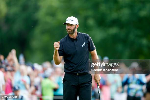 Dustin Johnson of Aces GC celebrates after making a birdie putt on the 18th hole during Day Three of the LIV Golf Invitational - Tulsa at Cedar Ridge...