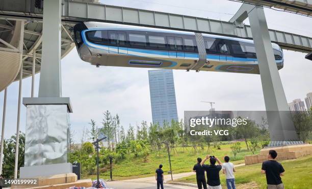 The futuristic Optics Valley sky train conducts trial runs on May 14, 2023 in Wuhan, Hubei Province of China. The train serves as a part of a 26.7...