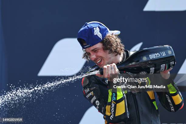 Marco Bezzecchi of Italy and Mooney VR46 Racing Team celebrates his win on the podium during the MotoGP of France - Race at Circuit Bugatti on May...