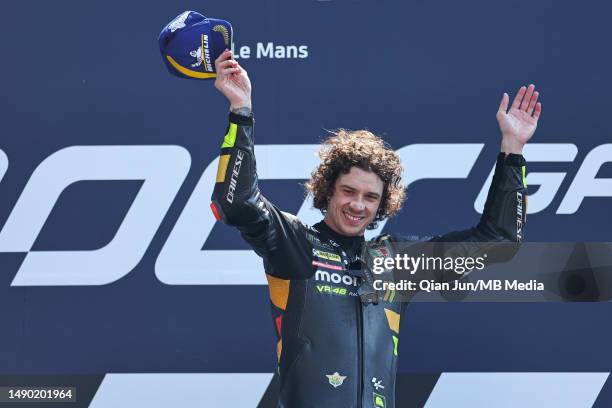 Marco Bezzecchi of Italy and Mooney VR46 Racing Team celebrates his win on the podium during the MotoGP of France - Race at Circuit Bugatti on May...