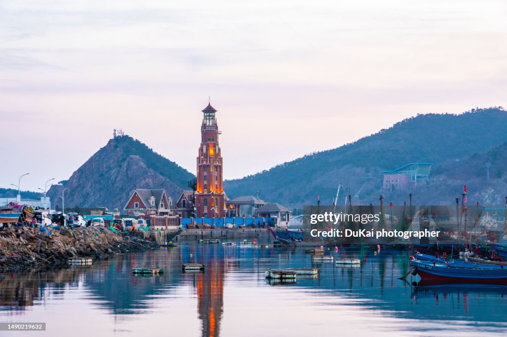 Night view of Dalian Fisherman's Wharf lighthouse