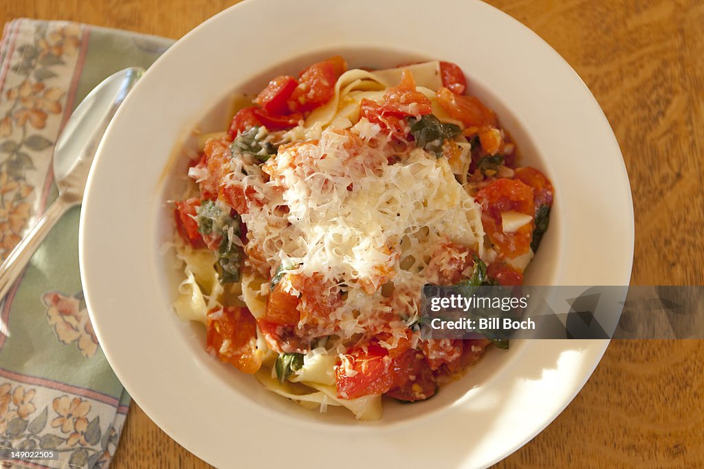 Tomato basil pasta with grated parmesan cheese