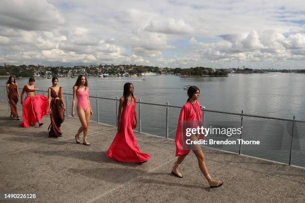 Models walk the runway during the BONDI BORN show during Afterpay Australian Fashion Week 2023 at The Coal Loader Centre for Sustainability on May...