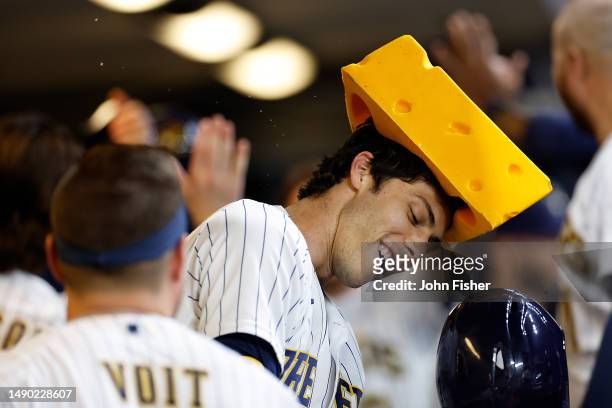 Christian Yelich of the Milwaukee Brewers celebrates after hitting a home run during the game against the Kansas City Royals at American Family Field...