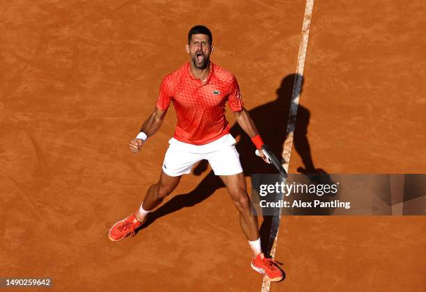 Novak Djokovic of Serbia celebrates during the Men's Singles Round of 32 match against Grigor Dimitrov of Bulgaria during Day Seven of the...
