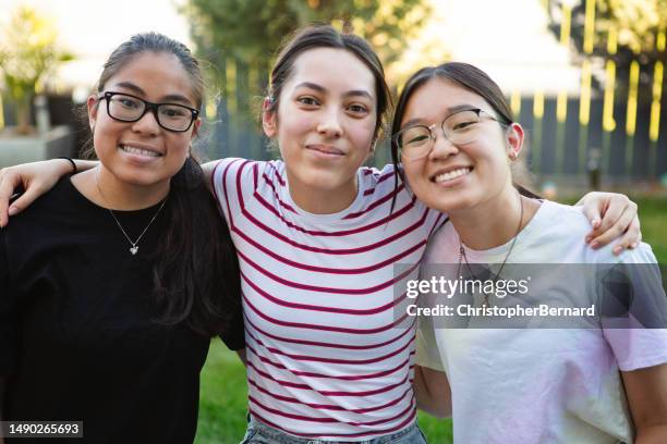 cousins bonding - cousin stock pictures, royalty-free photos & images