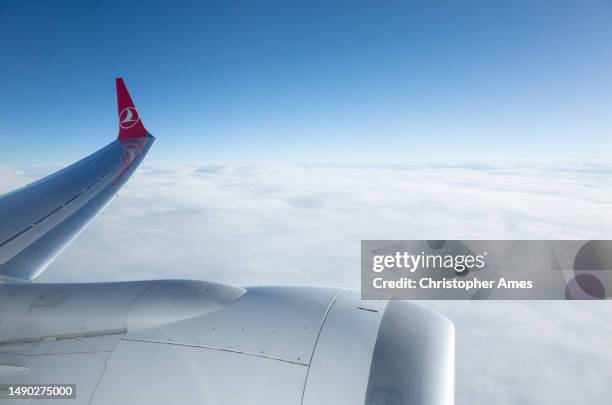 turkish airlines airbus flies above clouds - airbus stock symbol stock pictures, royalty-free photos & images