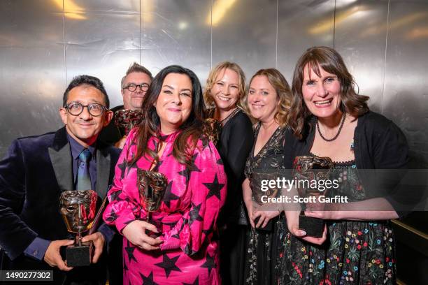 Front Row Jon Sen, Liza Mellody and Loretta Preece with cast & crew pose backstage win the Soap & Continuing Drama Award for 'Casualty' during the...