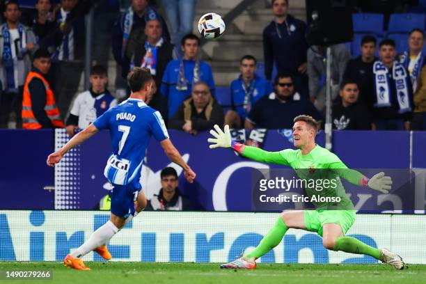 Javier Puado of RCD Espanyol scores the team's first goal during the LaLiga Santander match between RCD Espanyol and FC Barcelona at RCDE Stadium on...