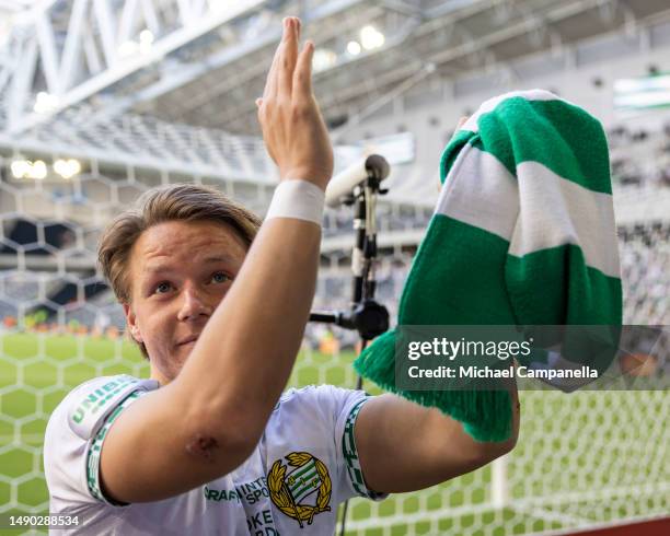 Hammarby's August Mikkelsen celebrates in front of supporters after an Allsvenskan match between Hammarby IF and Djurgardens IF at Tele2 Arena on May...
