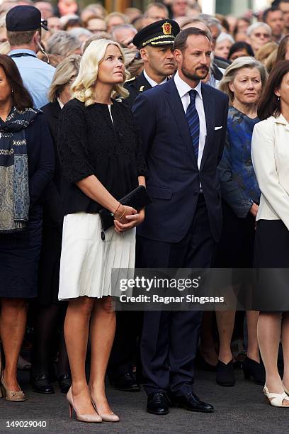 Princess Mette-Marit of Norway and Prince Haakon of Norway attend a wreath laying ceremony at the Ministries, to commemorate the anniversary of the...