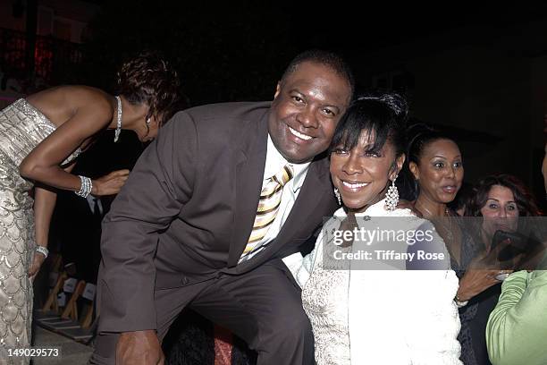 Former NFL player Rodney Peete and musician Natalie Cole attend the HollyRod Foundation's 14th Annual Design Care on July 21, 2012 in Malibu,...