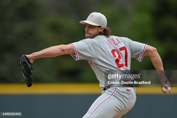 Aaron Nola of the Philadelphia Phillies pitches in the first inning of a game against the Colorado Rockies at Coors Field on May 14, 2023 in Denver,...