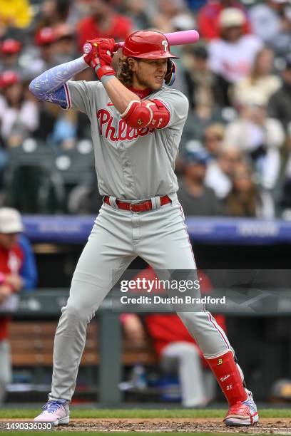 Alec Bohm of the Philadelphia Phillies bats in the second inning of a game against the Colorado Rockies at Coors Field on May 14, 2023 in Denver,...