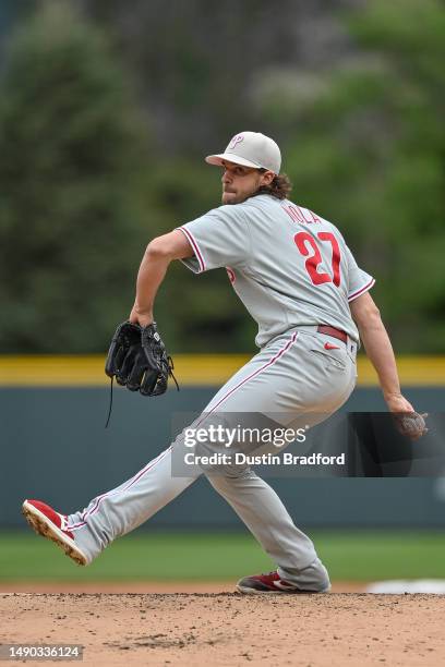 Aaron Nola of the Philadelphia Phillies pitches in the first inning of a game against the Colorado Rockies at Coors Field on May 14, 2023 in Denver,...