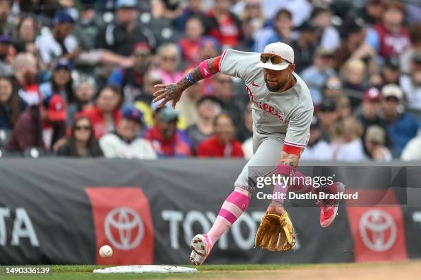 Edmundo Sosa of the Philadelphia Phillies fields a ground ball in the third inning of a game against the Colorado Rockies at Coors Field on May 14,...