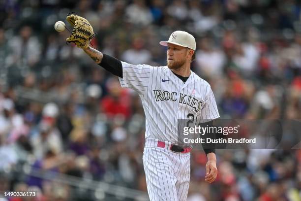 Kyle Freeland of the Colorado Rockies catches the ball from the catcher in the sixth inning of a game against the Philadelphia Phillies at Coors...